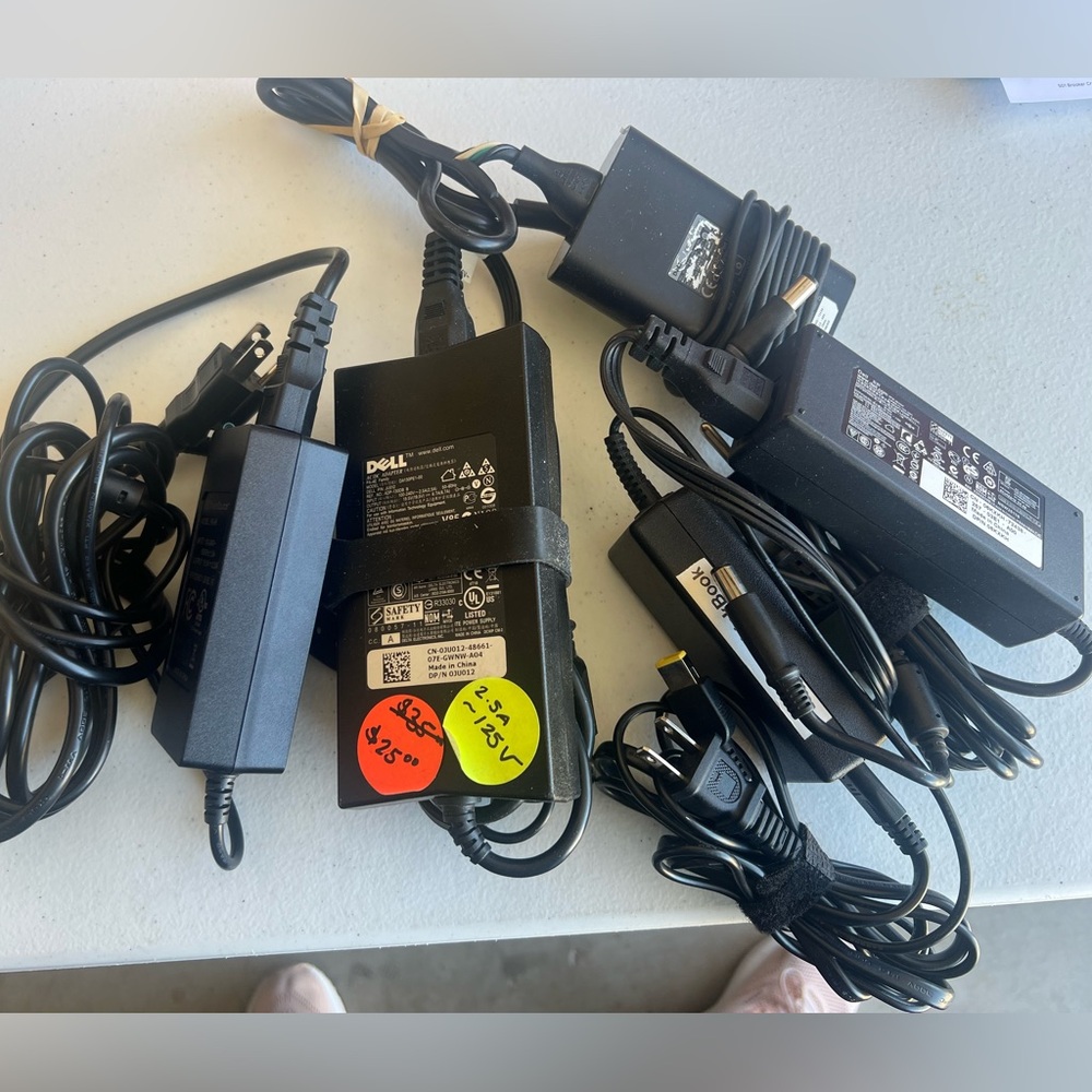 Entire lot of 5 laptop chargers.  Compatible with Dell and Lenovo laptops